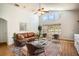 Bright living room with high ceilings, modern furnishings and large windows offering ample natural light and outdoor views at 2706 Rochelle Dr, Winter Haven, FL 33881