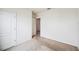 Bedroom with a large walk-in closet and neutral carpet flooring at 2759 Grandbury Grove Rd, Lakeland, FL 33811