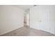 Empty bedroom featuring neutral carpet flooring at 2759 Grandbury Grove Rd, Lakeland, FL 33811
