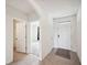Bright entryway featuring tile flooring, arched doorways, and neutral paint at 2759 Grandbury Grove Rd, Lakeland, FL 33811