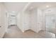 Bright entryway featuring tile flooring, arched doorways, and neutral paint at 2759 Grandbury Grove Rd, Lakeland, FL 33811