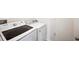 Laundry room features a newer Samsung washer and dryer set at 2759 Grandbury Grove Rd, Lakeland, FL 33811