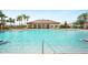 Large community swimming pool with a clubhouse and plenty of room for residents at 2759 Grandbury Grove Rd, Lakeland, FL 33811
