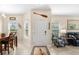 Inviting home entryway featuring tile floors, bright natural light, and a view into the living spaces at 2824 Attwater Loop, Winter Haven, FL 33884