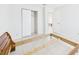 Unfurnished bedroom with a closet, bare bedframe, and tile floors at 31 Wagon Cir, Kissimmee, FL 34743
