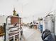 Bright garage needing clean up with ample space for parking and storage, plus water heater at 31 Wagon Cir, Kissimmee, FL 34743