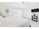 Inviting bedroom with sliding glass doors, closet space, and modern decor at 31 Wagon Cir, Kissimmee, FL 34743