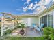 A patio with outdoor furniture and an enclosed yard, perfect for relaxation at 31 Wagon Cir, Kissimmee, FL 34743