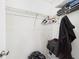 Bright walk-in closet with wire shelving and ample storage space for clothes and accessories at 31 Wagon Cir, Kissimmee, FL 34743