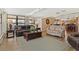 Comfortable living room featuring wood-look floors and an open layout at 326 Canal Dr, Lake Wales, FL 33859