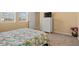 Bedroom with neutral carpet, dresser and view to front yard at 3821 Giorgio Dr, Winter Haven, FL 33884