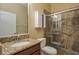 Bathroom featuring a granite vanity top and a glass enclosed shower at 3834 Bedford Ave, Winter Haven, FL 33884