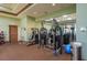Traditions community gym, featuring weight machines and fitness equipment with ample mirror space at 3834 Bedford Ave, Winter Haven, FL 33884