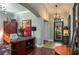 Inviting office space featuring a large desk, wood floors, and bright lighting at 3834 Bedford Ave, Winter Haven, FL 33884