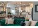Modern kitchen with granite countertops, stainless steel appliances and view to the connected dining room at 3834 Bedford Ave, Winter Haven, FL 33884