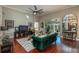 Spacious living room with hardwood floors, modern decor, and glass sliding doors at 3834 Bedford Ave, Winter Haven, FL 33884