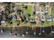 Aerial view of homes with waterfront access and private docks on a sunny day at 3943 Chambers St, Lake Wales, FL 33898