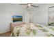 Bedroom with a ceiling fan and a view of a television at 3943 Chambers St, Lake Wales, FL 33898