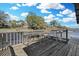 Waterfront dock featuring a stainless steel cleaning station and metal table on a sunny day at 3943 Chambers St, Lake Wales, FL 33898