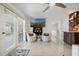 Cozy sitting area featuring lake views, TV, bookshelves and comfortable seating at 3943 Chambers St, Lake Wales, FL 33898