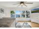 Serene main bedroom boasting water views, hardwood floors, and generous natural light at 3943 Chambers St, Lake Wales, FL 33898