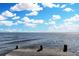 Breathtaking water view from the dock, offering a serene and picturesque setting with clear skies and calm waters at 3943 Chambers St, Lake Wales, FL 33898
