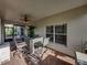 Enjoy the screened-in patio with brick flooring, window views and seating at 4080 Ashton Club Dr, Lake Wales, FL 33859