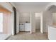 Laundry area with washer/dryer hookup, storage and easy access to the outside patio at 4084 Winding Vine Dr, Lakeland, FL 33812