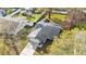 Aerial view of the home with a large backyard and a neighboring pool at 433 Carleton St, Lakeland, FL 33803