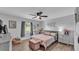 Stylized bedroom features a ceiling fan, a window, and decor at 433 Carleton St, Lakeland, FL 33803