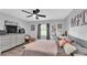 Bright bedroom features fan, dresser, and decor at 433 Carleton St, Lakeland, FL 33803