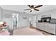 Cozy bedroom features stylish decor, modern furniture, and a ceiling fan at 433 Carleton St, Lakeland, FL 33803