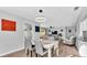 Open-concept dining area offering seamless flow into the living room and backyard views at 433 Carleton St, Lakeland, FL 33803