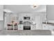 Modern kitchen featuring granite countertops and stainless steel appliances at 433 Carleton St, Lakeland, FL 33803