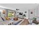 Comfortable living room with a large window offering natural light and backyard views at 433 Carleton St, Lakeland, FL 33803
