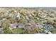 Aerial view showcasing the neighborhood with mature trees and variety of homes at 433 Carleton St, Lakeland, FL 33803