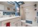 Bathroom featuring blue accent wall paint, white sink, and a bathtub with shower at 4422 Glenns Lndg, Winter Haven, FL 33884