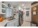 Updated kitchen with stainless steel appliances, white cabinets and eat-in nook at 4422 Glenns Lndg, Winter Haven, FL 33884