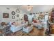Open living room with comfortable seating, decorative accents, and tiled floors at 4422 Glenns Lndg, Winter Haven, FL 33884