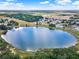 Expansive aerial view of the lake and surrounding residential community at 496 Lake Suzanne Dr, Lake Wales, FL 33859