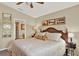 Calm main bedroom with a view to the on-suite bath at 496 Lake Suzanne Dr, Lake Wales, FL 33859