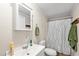 Well-lit bathroom with a shower/tub combo, a vanity with a mirror, and modern fixtures at 519 Sharon Hill Ct, Winter Haven, FL 33880