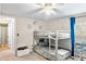 bedroom featuring bunk beds, a ceiling fan, and space for play at 519 Sharon Hill Ct, Winter Haven, FL 33880