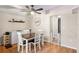 Dining area features wood floors, and seating for four at 519 Sharon Hill Ct, Winter Haven, FL 33880