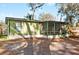 Charming home featuring a screened-in porch perfect for enjoying the outdoors at 519 Sharon Hill Ct, Winter Haven, FL 33880