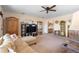 Open living room featuring neutral colors and a ceiling fan with a light at 5767 Lakeside Landings Blvd, Winter Haven, FL 33881