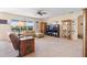 Cozy living room filled with natural light and comfortable furnishings at 5767 Lakeside Landings Blvd, Winter Haven, FL 33881