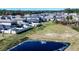 Aerial shot of home in a residential community near a serene pond and natural surroundings at 578 Preserve Pointe Blvd, Davenport, FL 33837