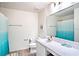 Bathroom featuring single sink, light wood floors, and a framed picture on the wall at 578 Preserve Pointe Blvd, Davenport, FL 33837
