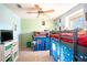 View of bedroom with carpet, ceiling fan, bunkbeds, and a window with natural light at 578 Preserve Pointe Blvd, Davenport, FL 33837